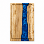 Planche à découper en bois d'olivier et résine bleue, vue de dessus